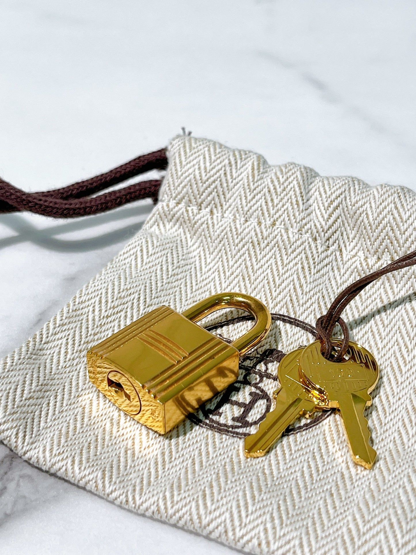 HERMES PICOTIN 18, ETOUPE/GOLD