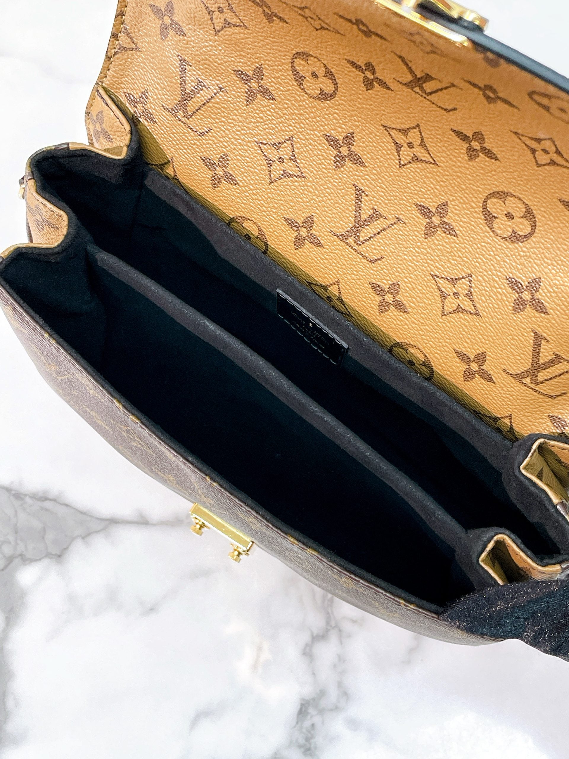 LV POCHETTE METIS