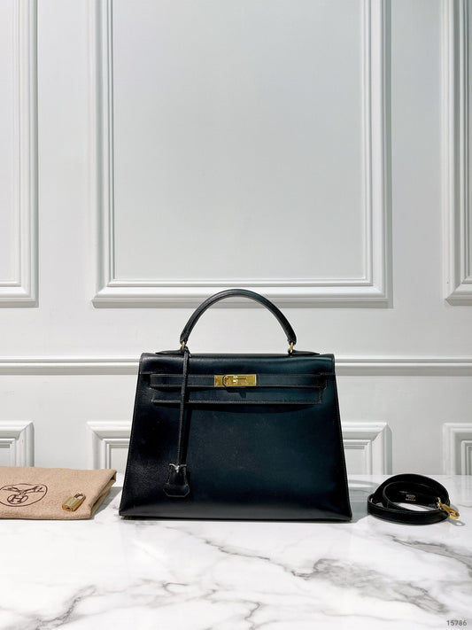 HERMES VINTAGE KELLY 32, NOIR/GOLD