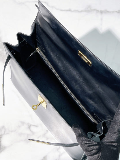 HERMES VINTAGE KELLY 32, NOIR/GOLD