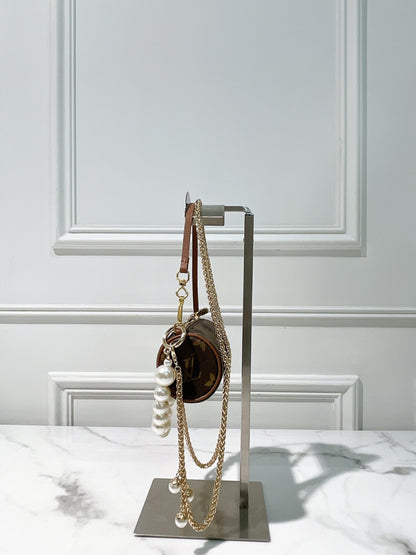 LV VINTAGE MINI ROLLER, MONOGRAM