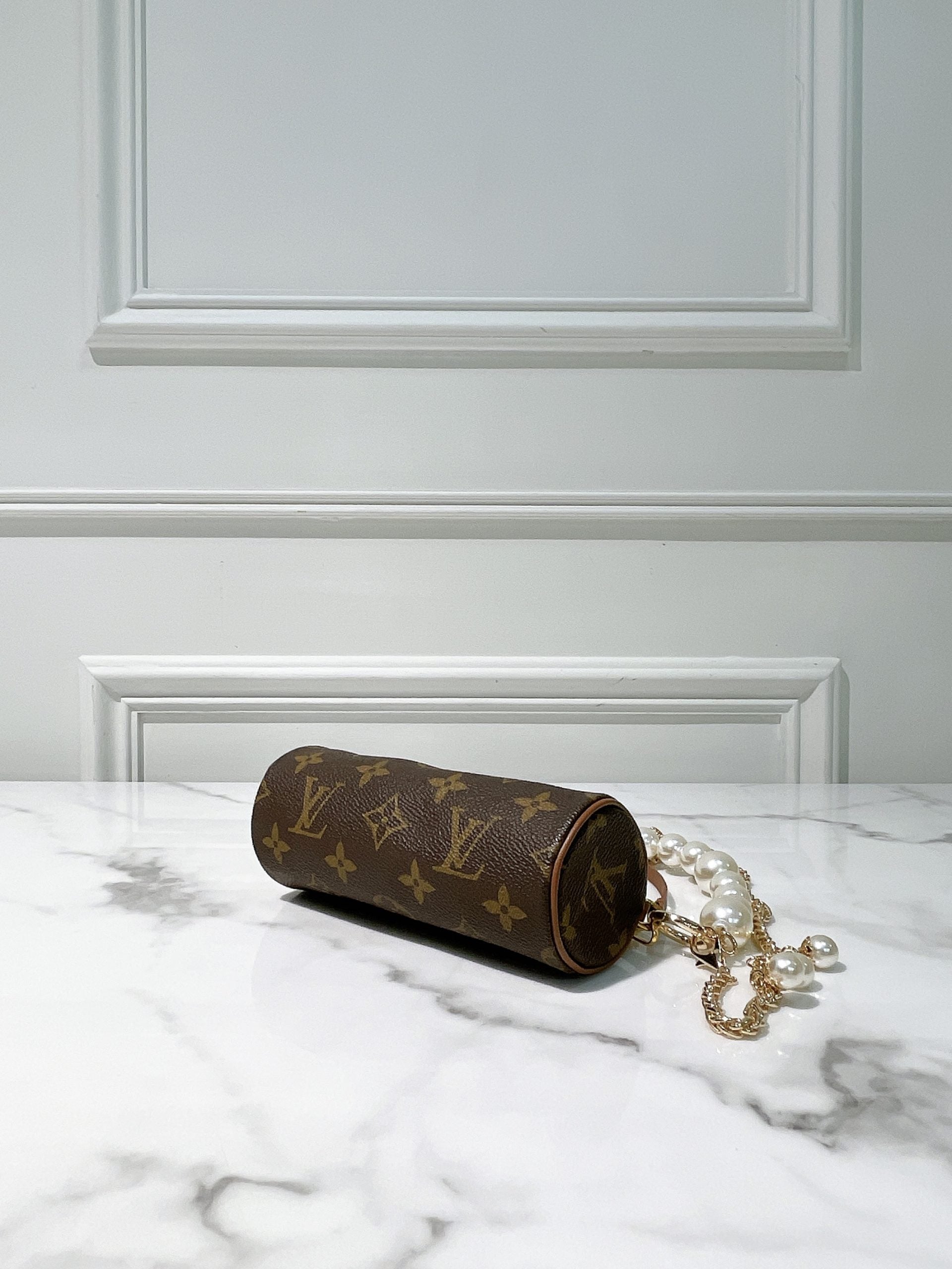 LV VINTAGE MINI ROLLER, MONOGRAM