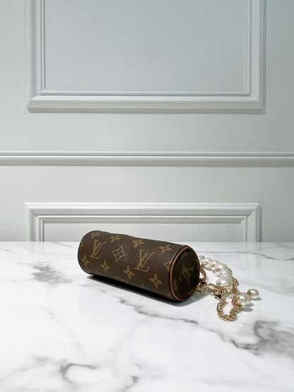 LV VINTAGE MINI ROLLER, MONOGRAM
