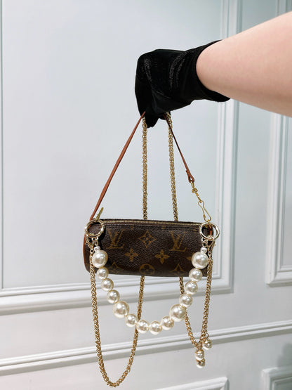 LV VINTAGE MINI ROLLER, MONOGRAM