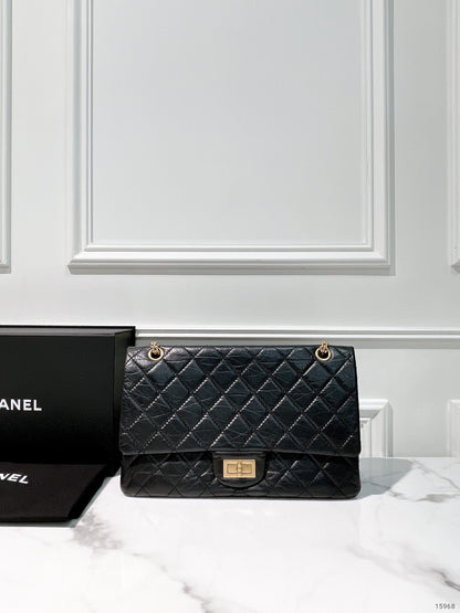 CHANEL MAXI 2.55 HANDBAG, Black/Gold