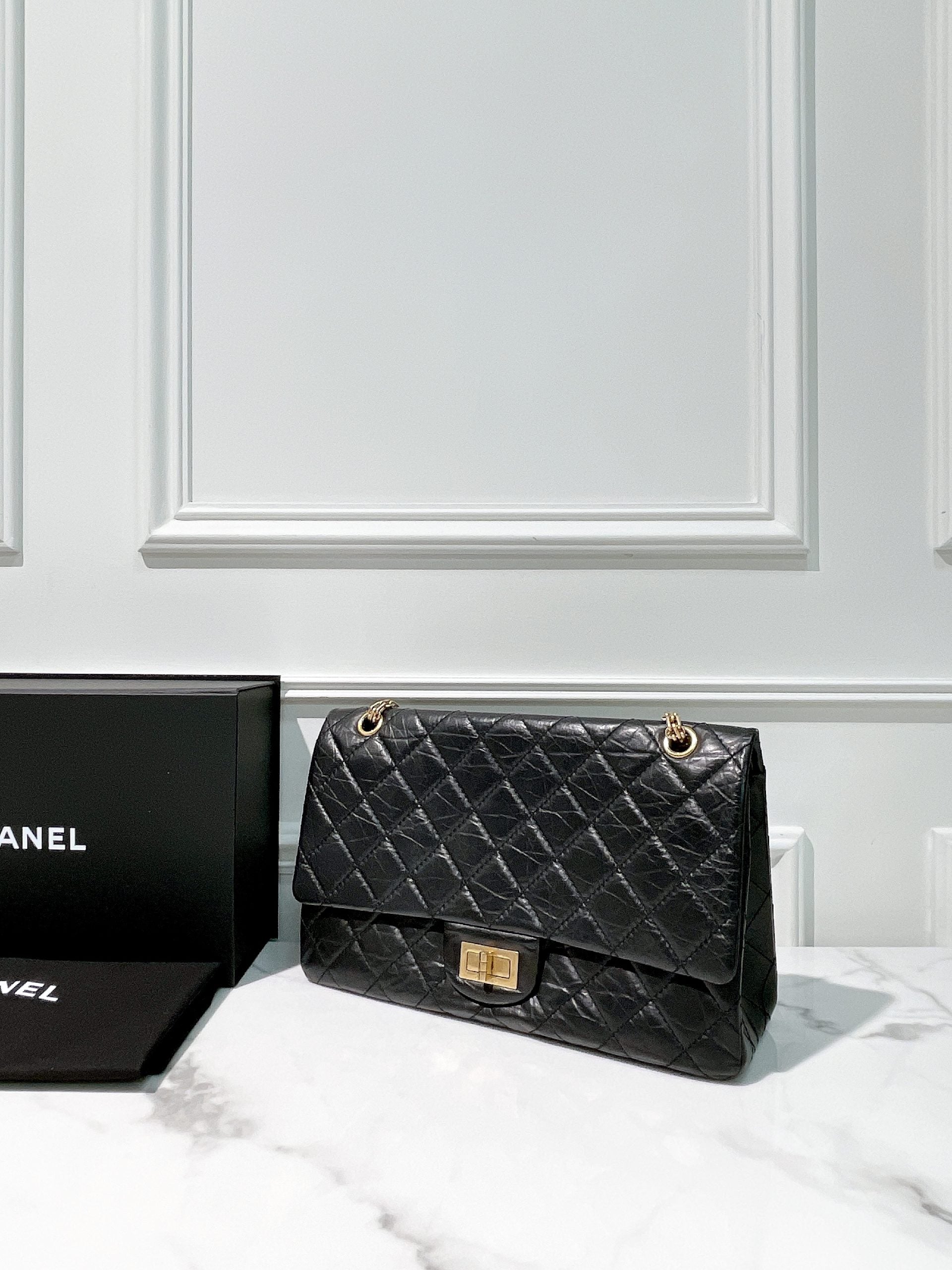 CHANEL MAXI 2.55 HANDBAG, Black/Gold