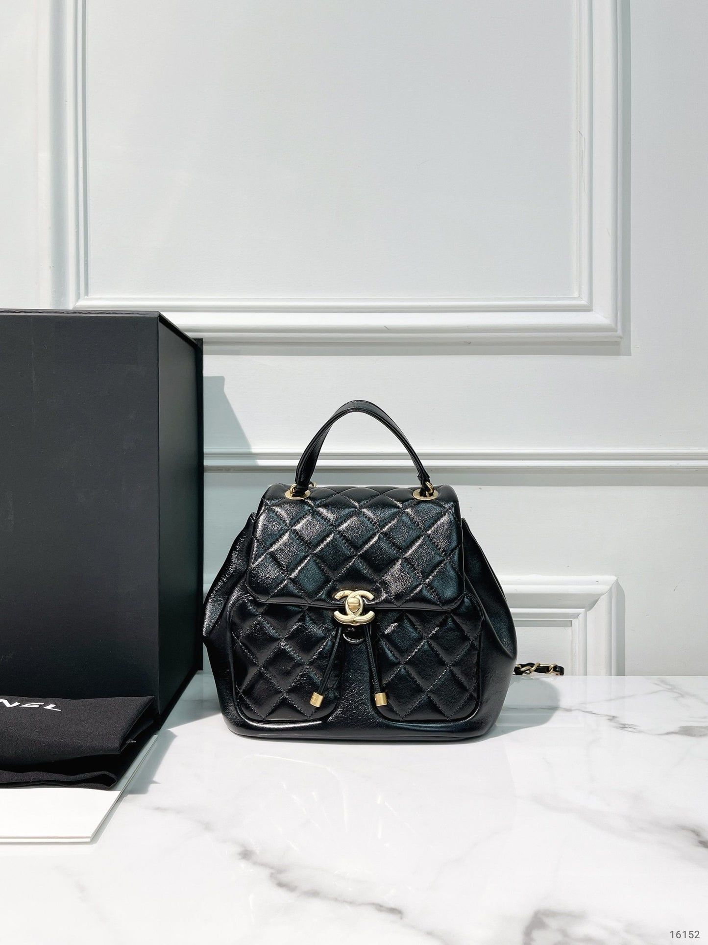 CHANEL 23K BACKPACK, Black/Gold