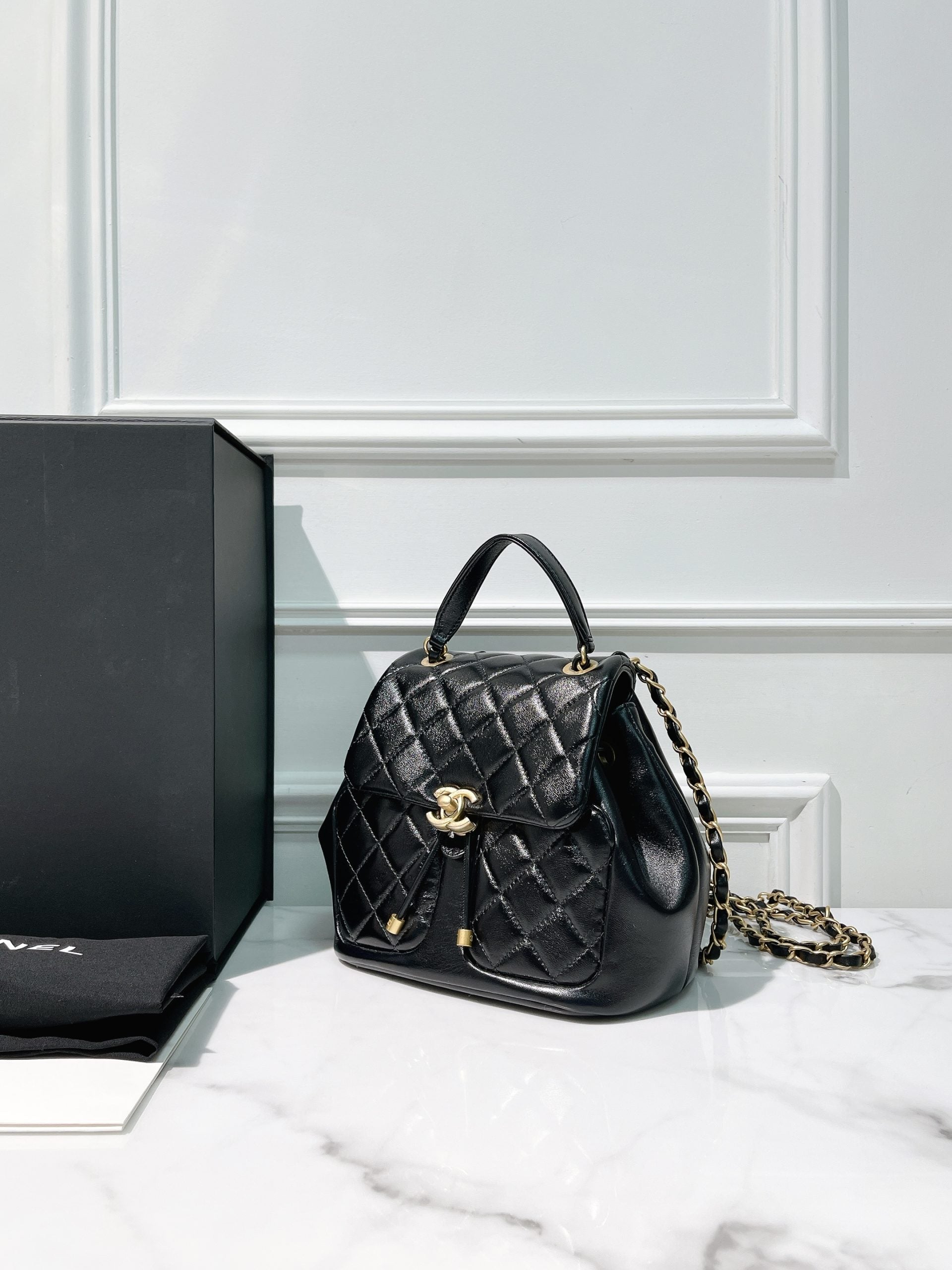 CHANEL 23K BACKPACK, Black/Gold