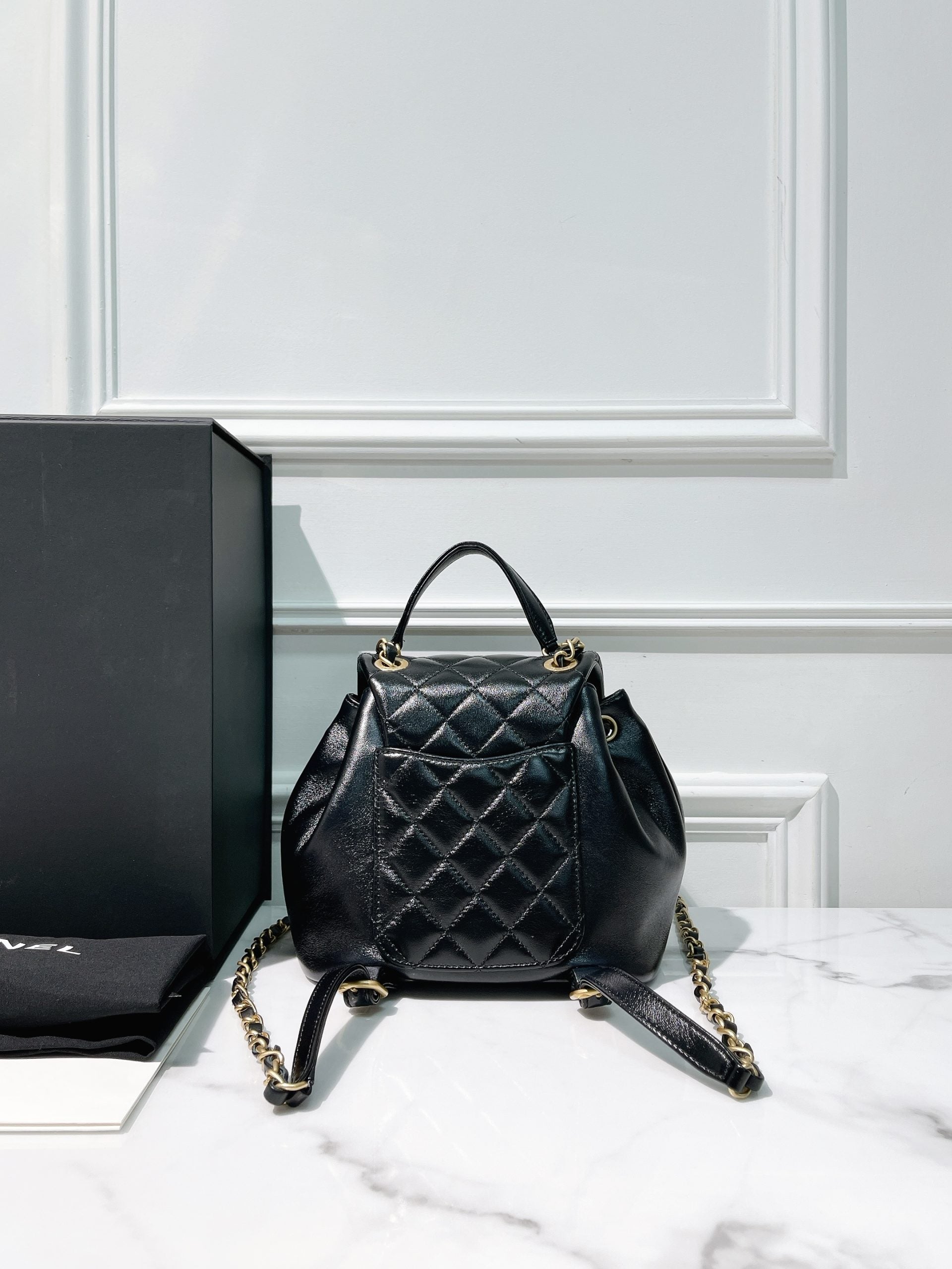 CHANEL 23K BACKPACK, Black/Gold