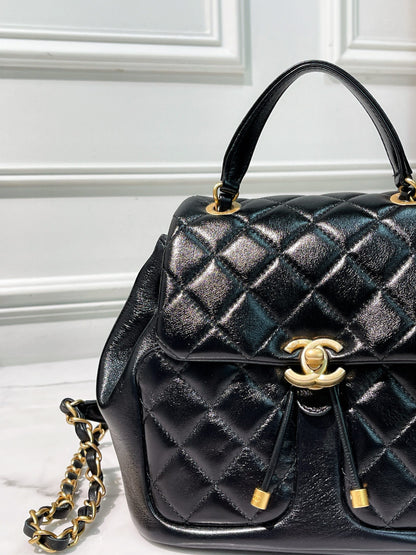 CHANEL 23K BACKPACK, Black/Gold