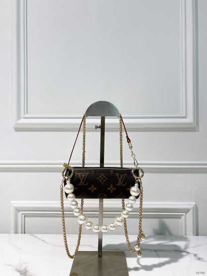 LV VINTAGE MINI ROLLOR, Monogram