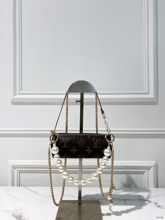 LV VINTAGE MINI ROLLOR, Monogram