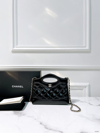 CHANEL 25P NANO 31 BAG, Black/Gold