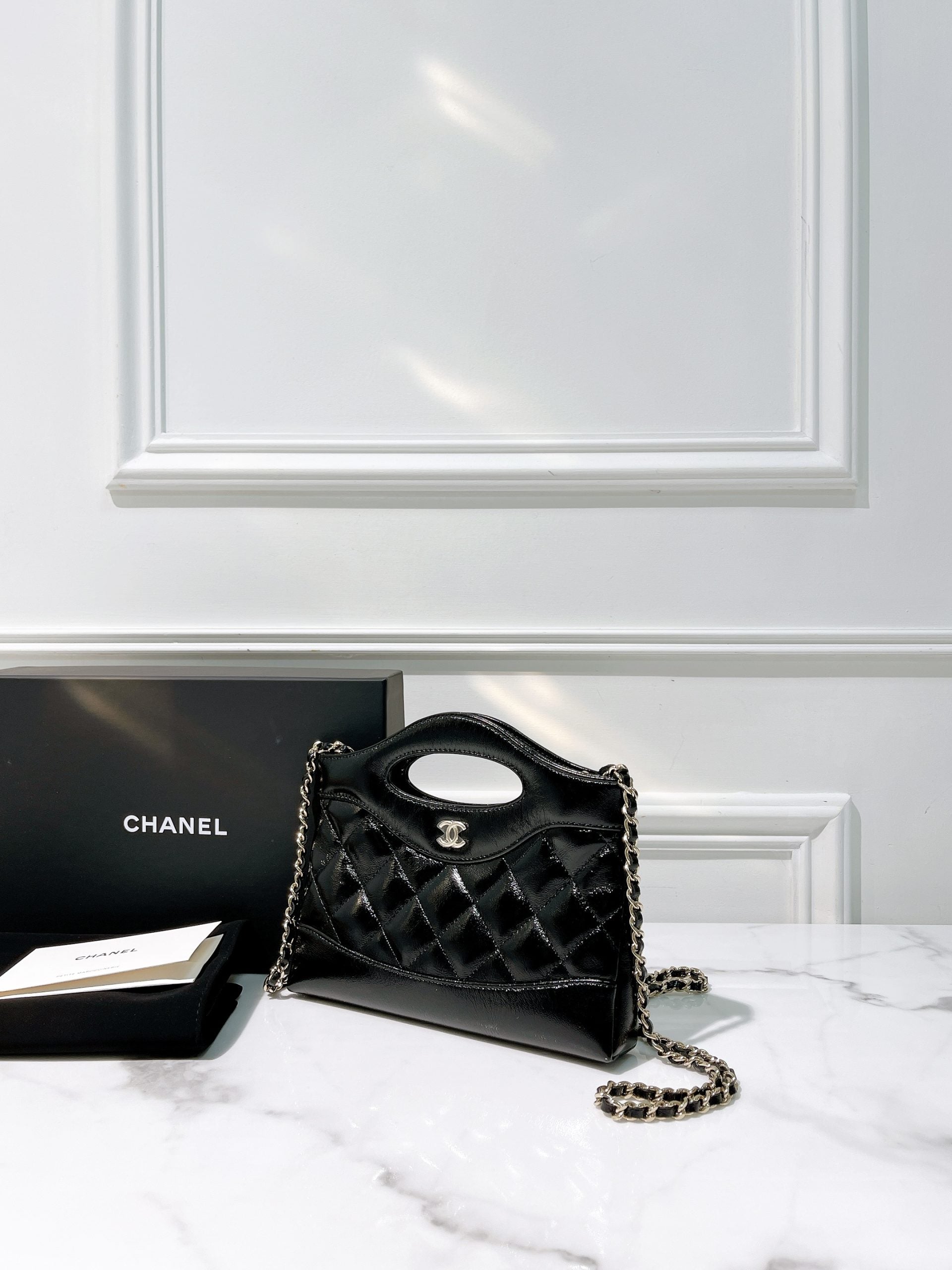 CHANEL 25P NANO 31 BAG, Black/Gold