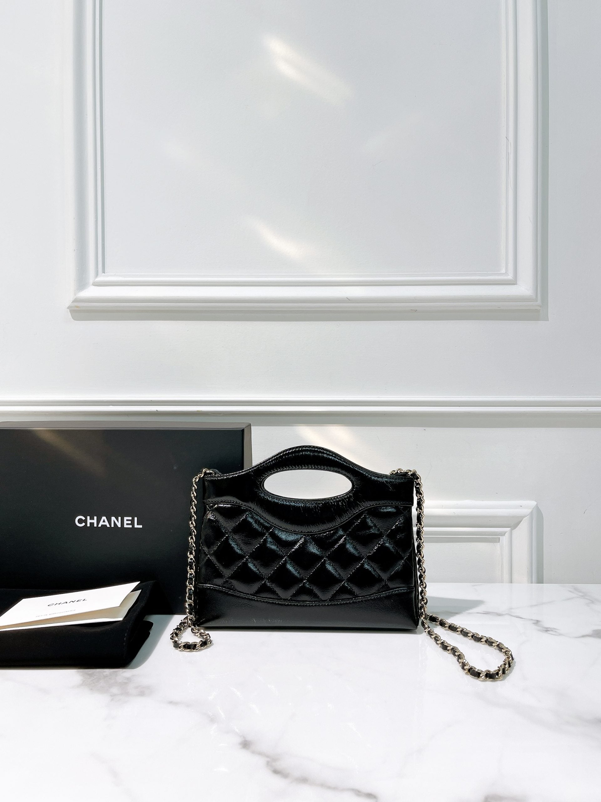 CHANEL 25P NANO 31 BAG, Black/Gold