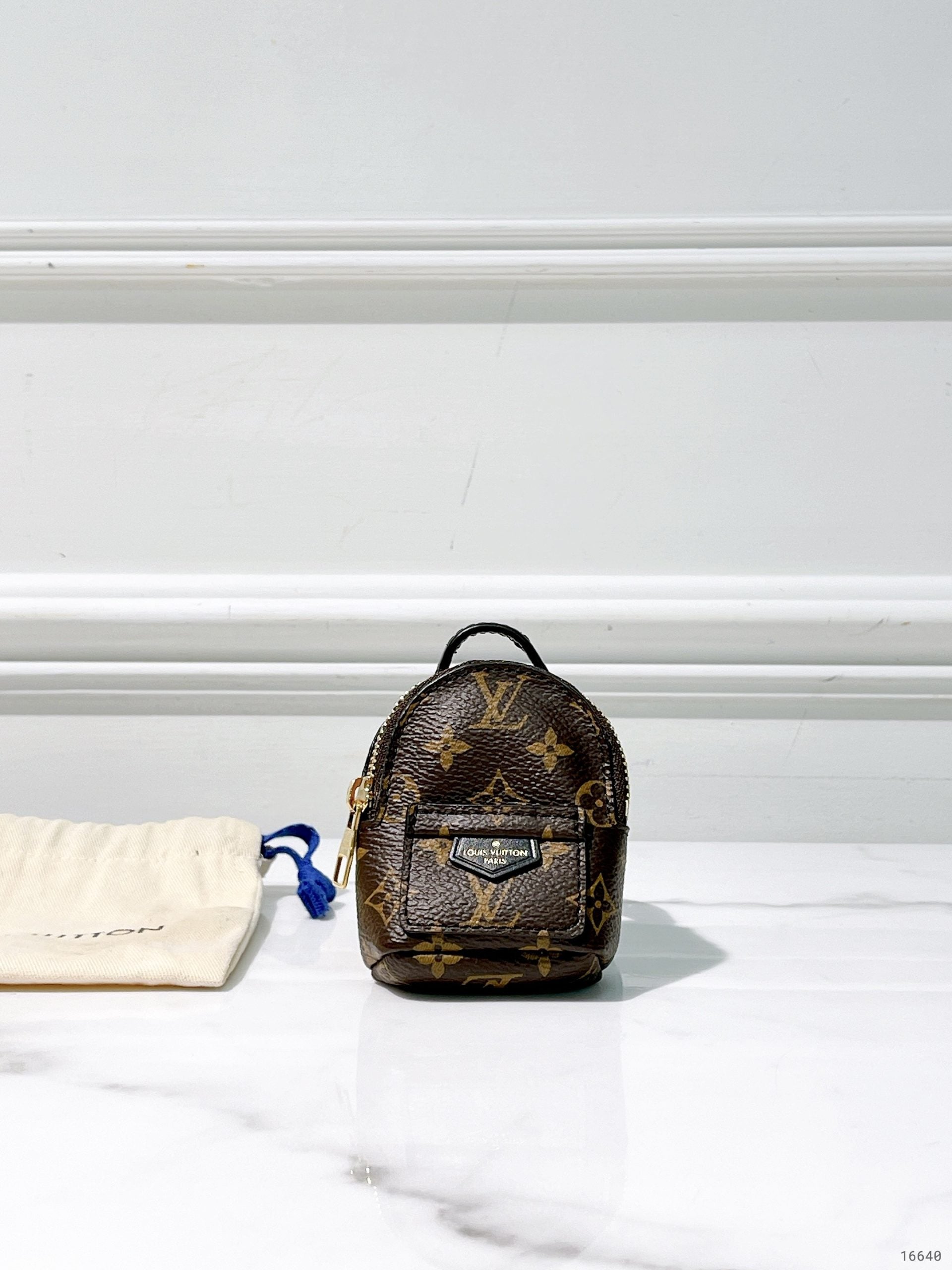 LV PARTY PALM SPRING BRACELET BAG, Monogram