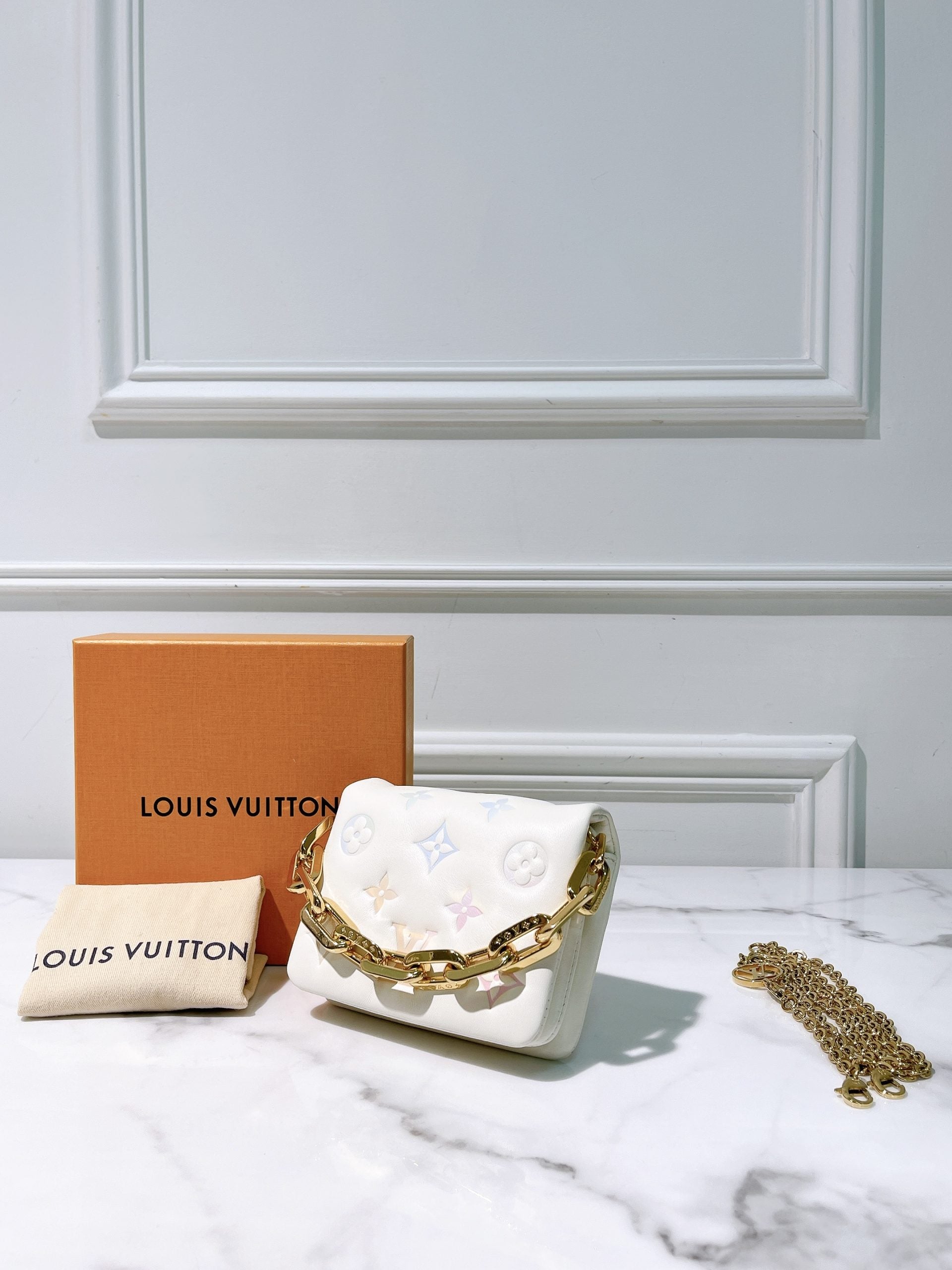 LV MINI COUSSIN, White/Gold