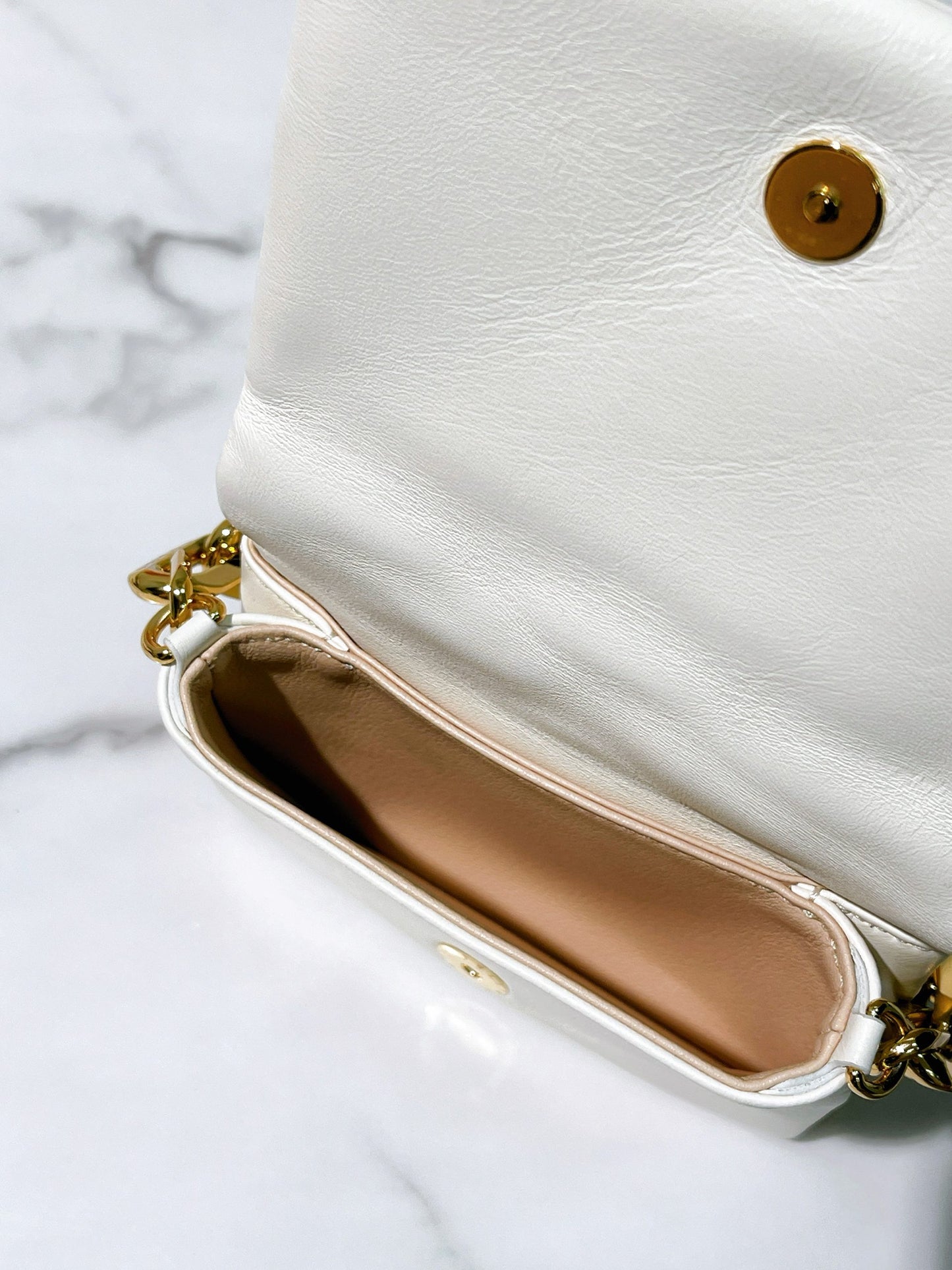 LV MINI COUSSIN, White/Gold