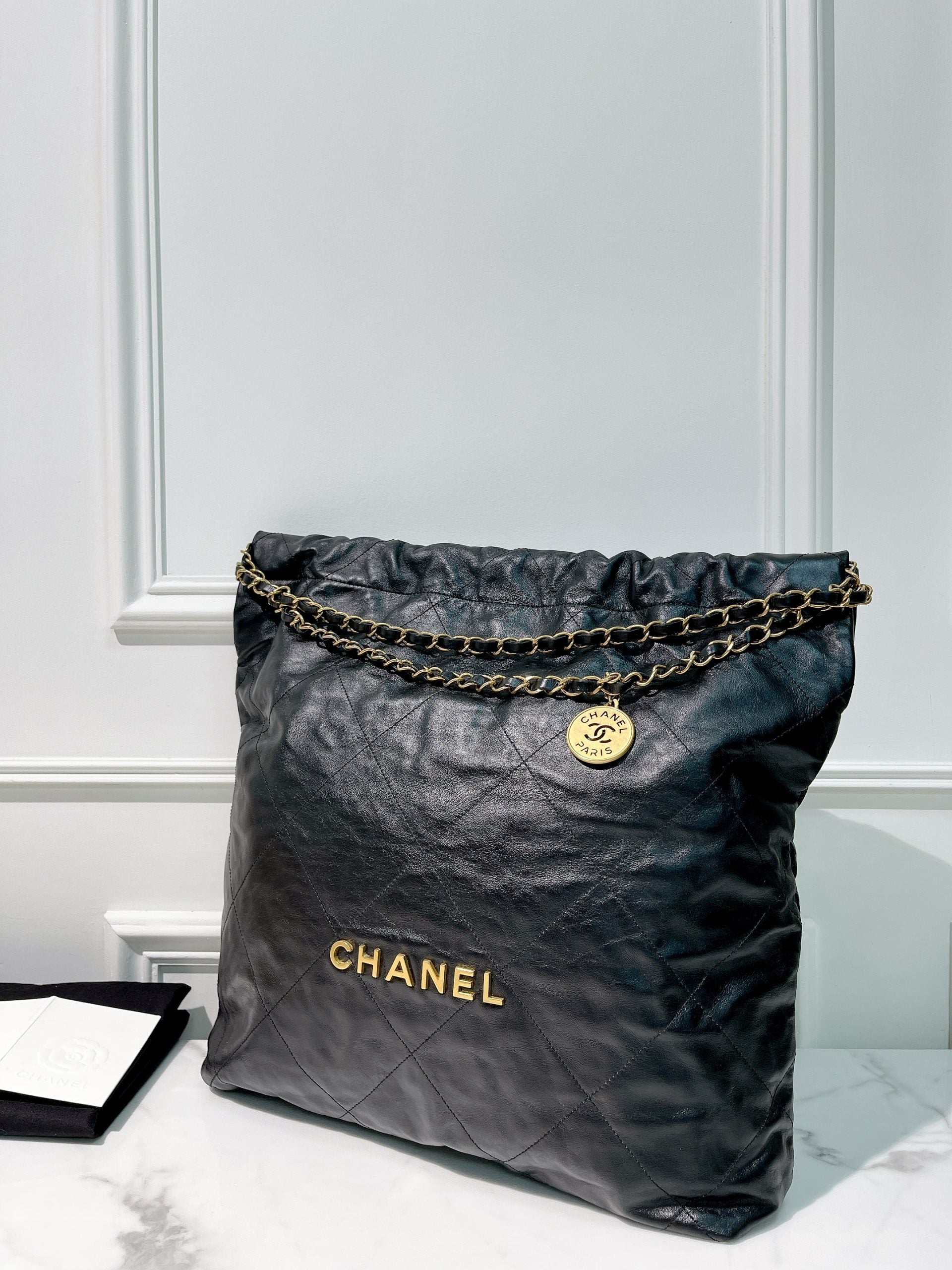 CHANEL LARGE 22 BAG, Black/Gold