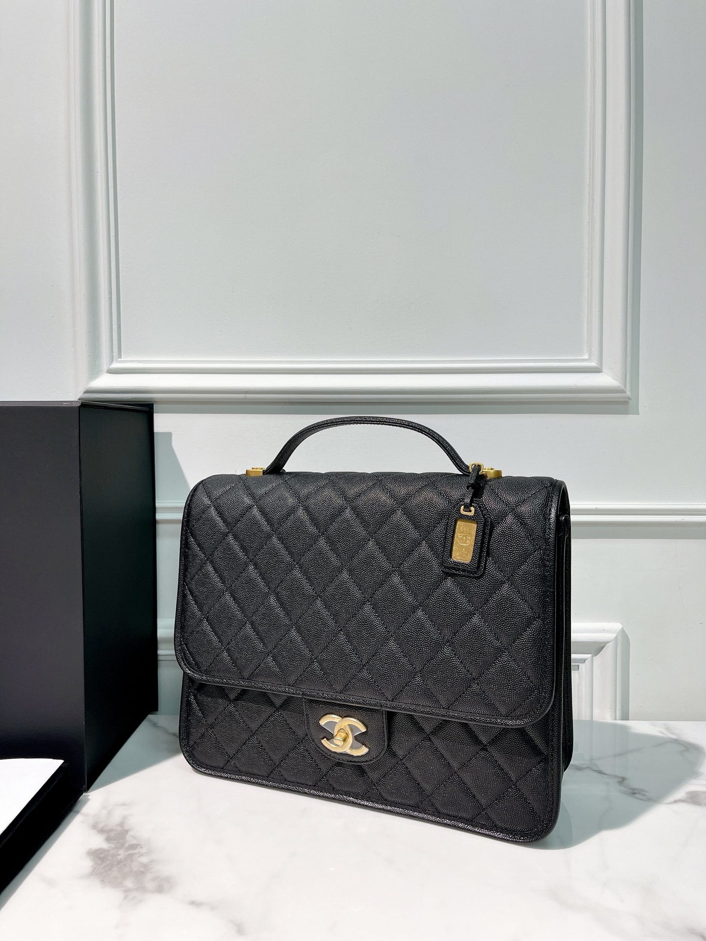 CHANEL 22K BACKPACK, Black/Gold