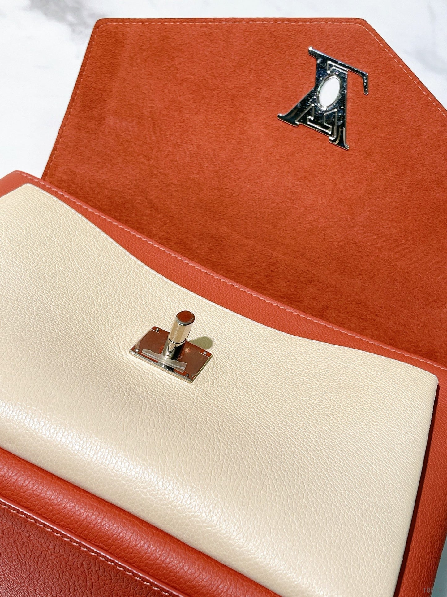 LV MYLOCKME TOP HANDLE BAG