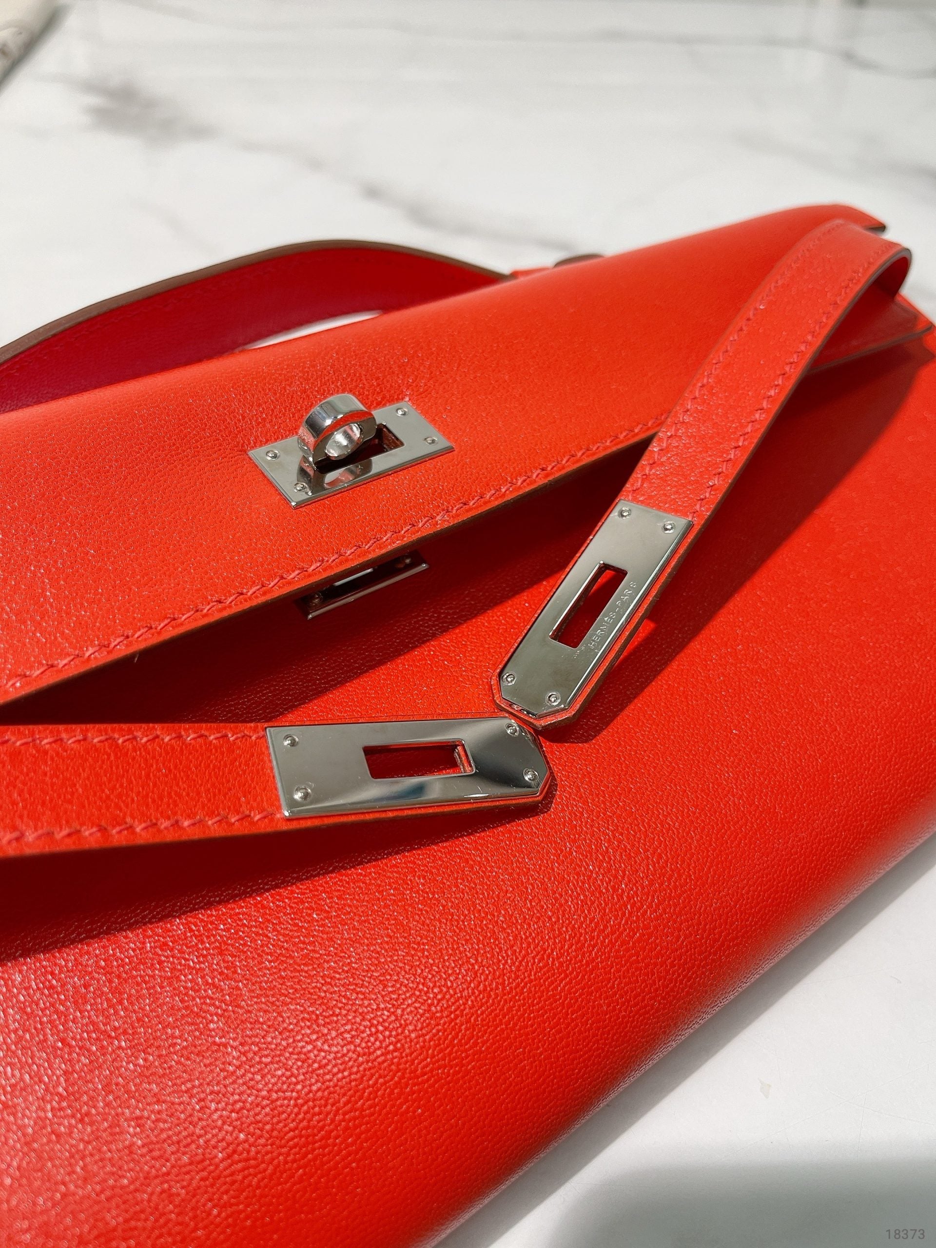 HERMES KELLY CUT, Rough Tomate/Silver