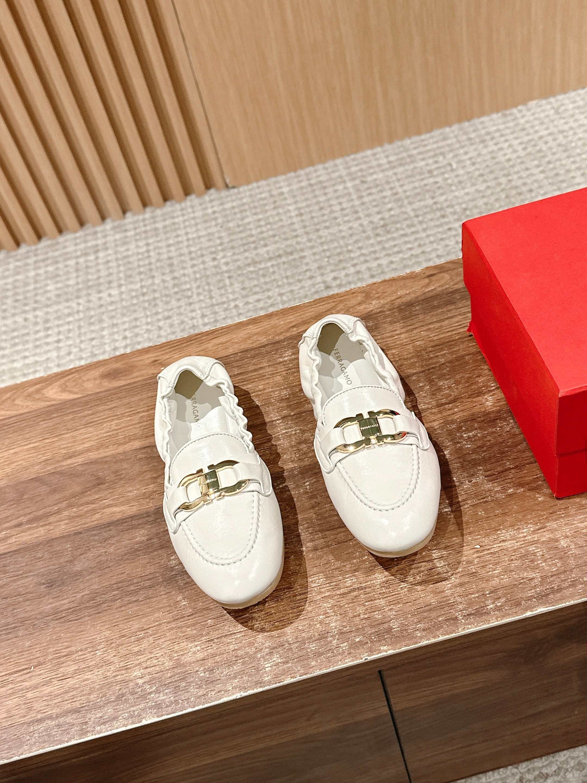 Ferragamo Horsebit Ballet Flats (egg-roll shoes), White