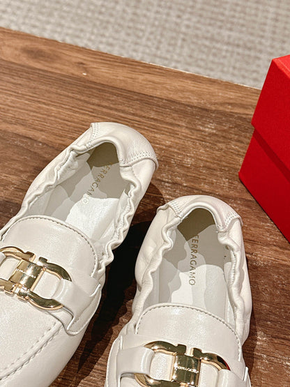 Ferragamo Horsebit Ballet Flats (egg-roll shoes), White