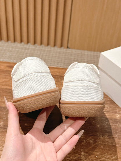 The Row Minimalist Low-Top Canvas Sneakers, Black