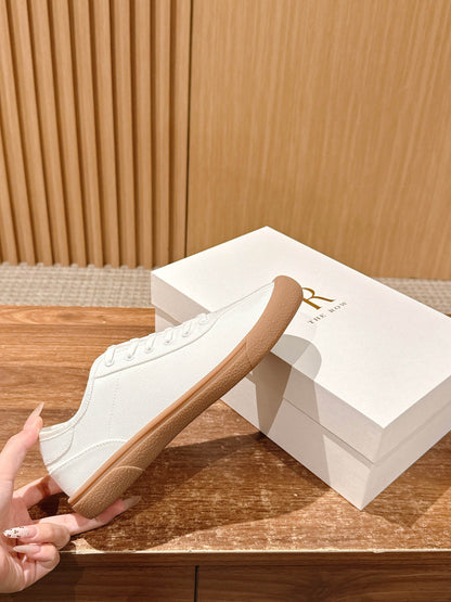 The Row Minimalist Low-Top Canvas Sneakers, Black