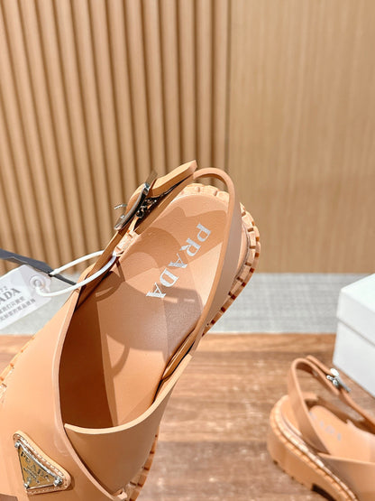 Prada New Cross-Strap Serrated-Sole Roman Thick-Platform Rubber Sandals, Brown