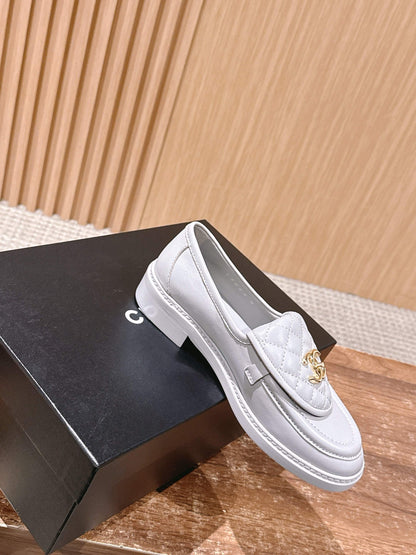 CHANEL Quilted Classic Vintage Sheepskin Loafers, White