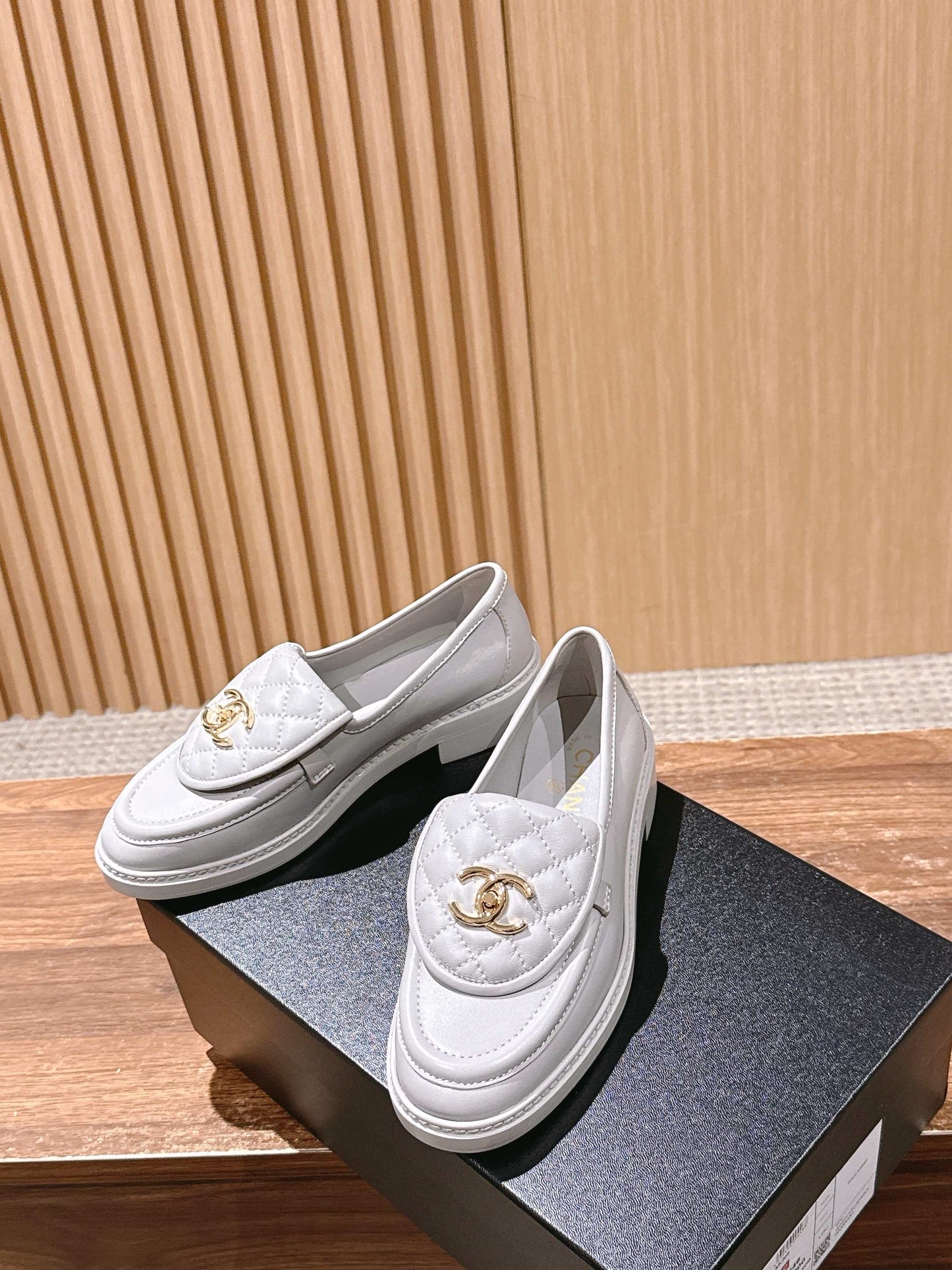 CHANEL Quilted Classic Vintage Sheepskin Loafers, White