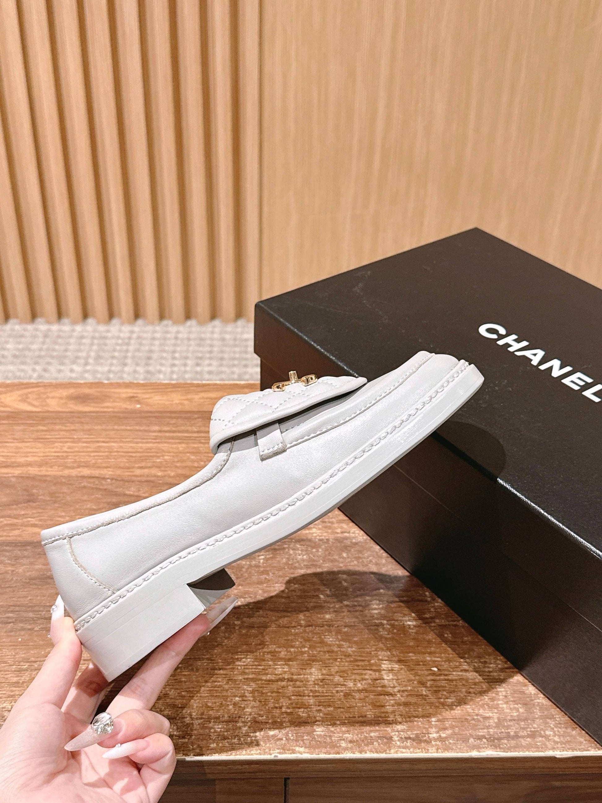 CHANEL Quilted Classic Vintage Sheepskin Loafers, White