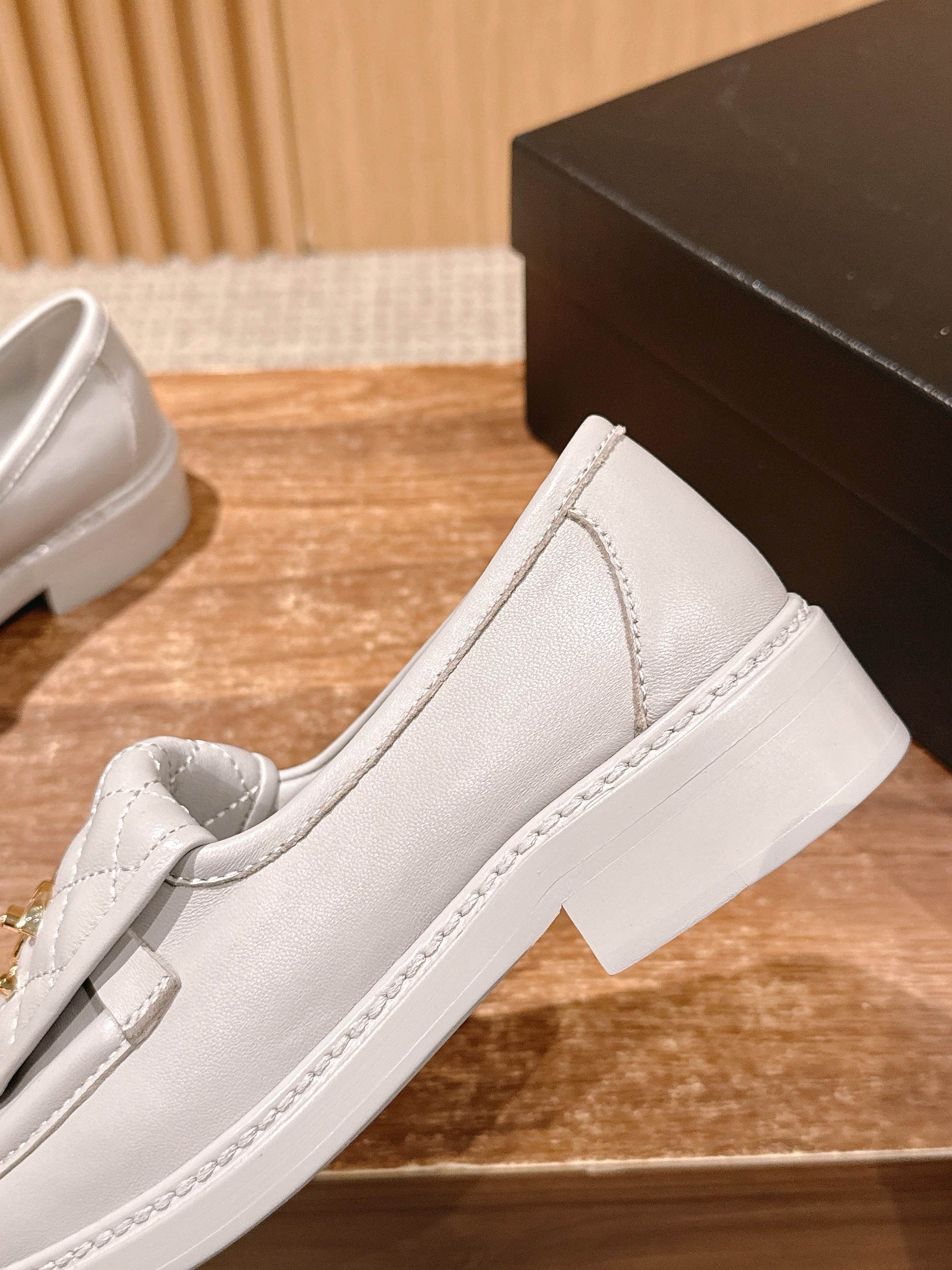 CHANEL Quilted Classic Vintage Sheepskin Loafers, White