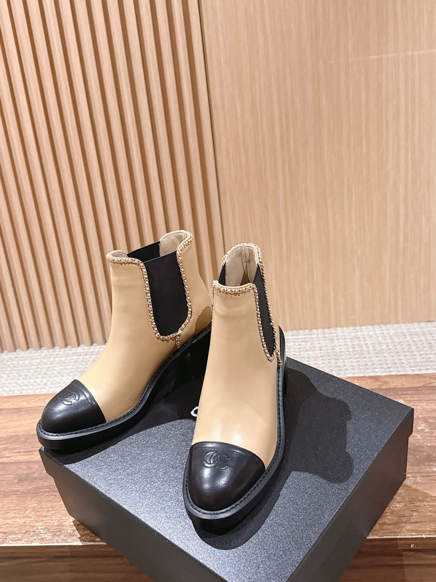 Chanel New Panelled-Chain Block-Heel Ankle Boots, Beige