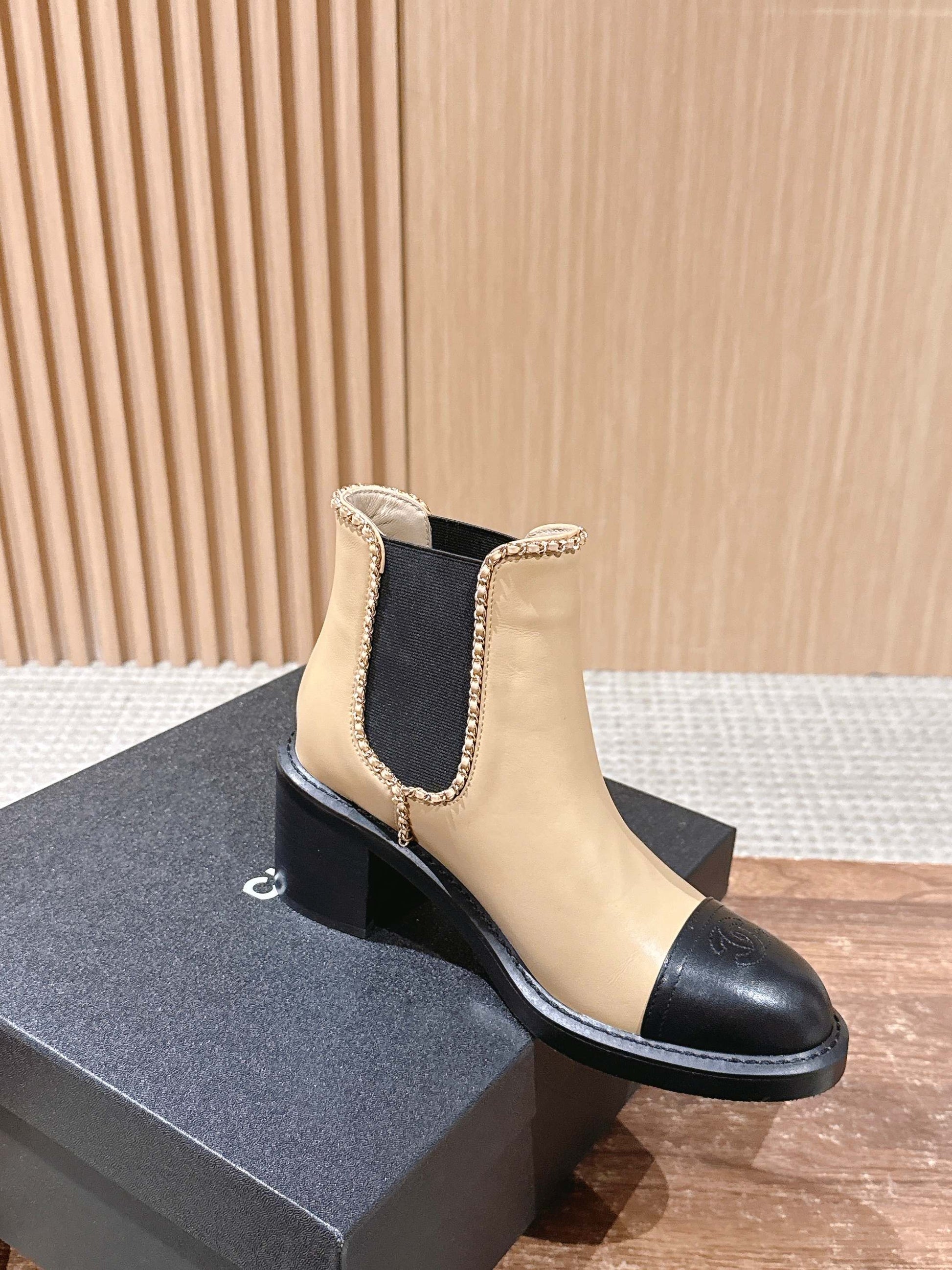 Chanel New Panelled-Chain Block-Heel Ankle Boots, Beige