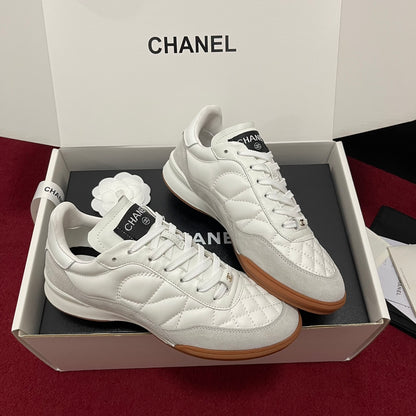 Chanel 25s New Quilted Trainers, White