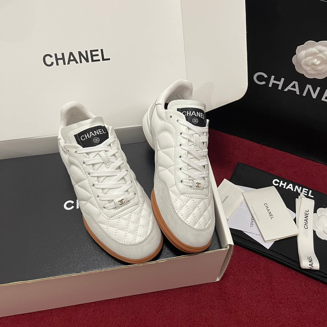 Chanel 25s New Quilted Trainers, White