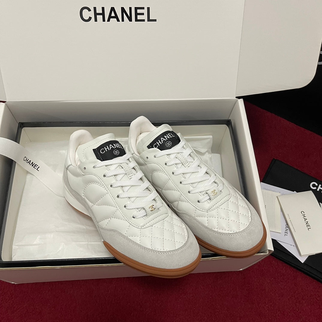 Chanel 25s New Quilted Trainers, White