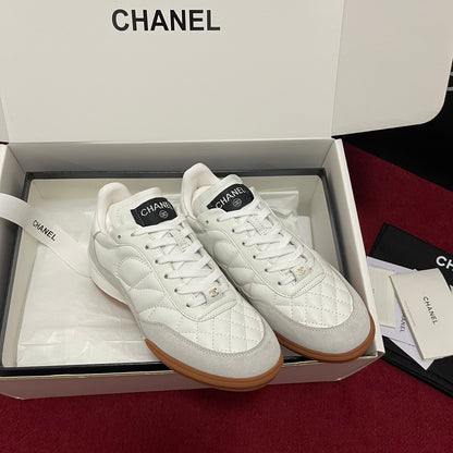 Chanel 25s New Quilted Trainers, White