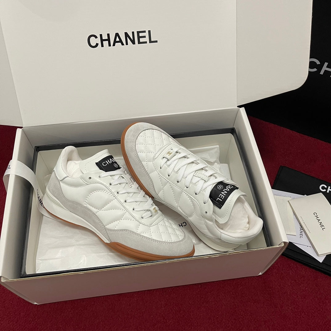Chanel 25s New Quilted Trainers, White