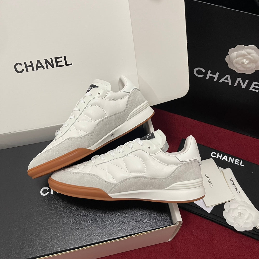 Chanel 25s New Quilted Trainers, White