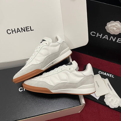 Chanel 25s New Quilted Trainers, White