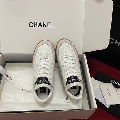 Chanel 25s New Quilted Trainers, White