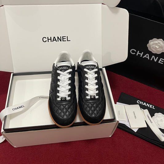 Chanel 25s New Quilted Trainers, Black
