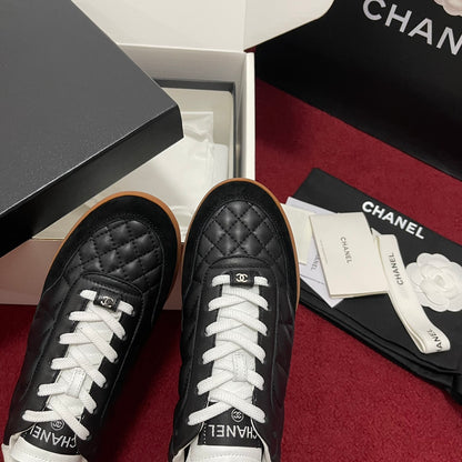 Chanel 25s New Quilted Trainers, Black