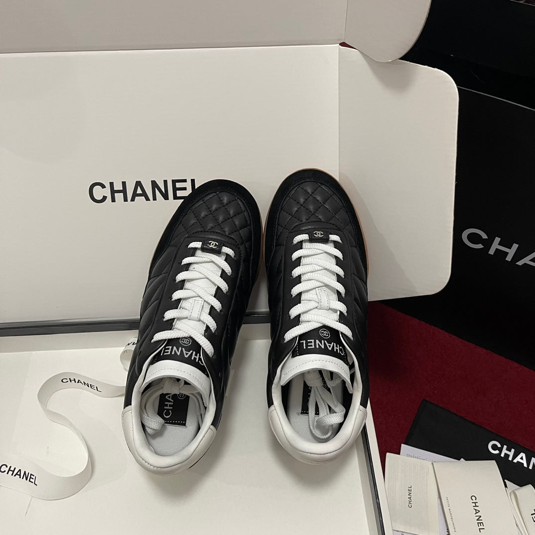 Chanel 25s New Quilted Trainers, Black