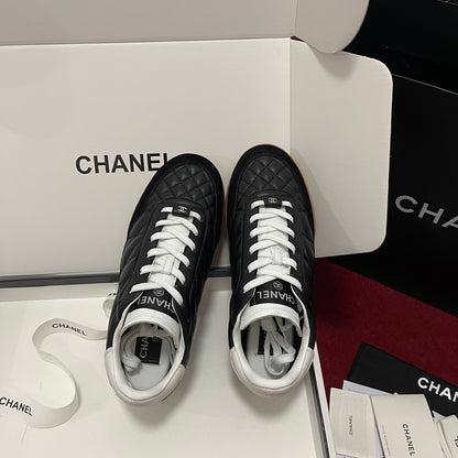 Chanel 25s New Quilted Trainers, Black