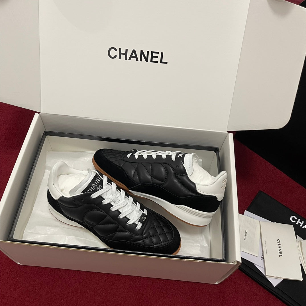 Chanel 25s New Quilted Trainers, Black